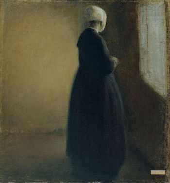 An Old Woman Standing By A Window