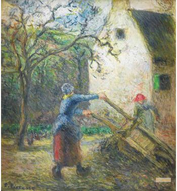 Woman Emptying A Wheelbarrow