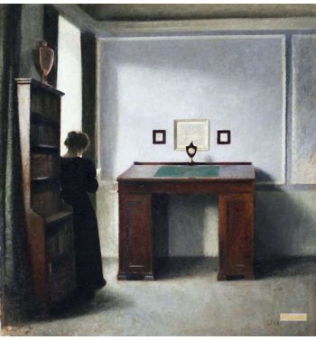 A Writing Table And A Young Woman In An Interior